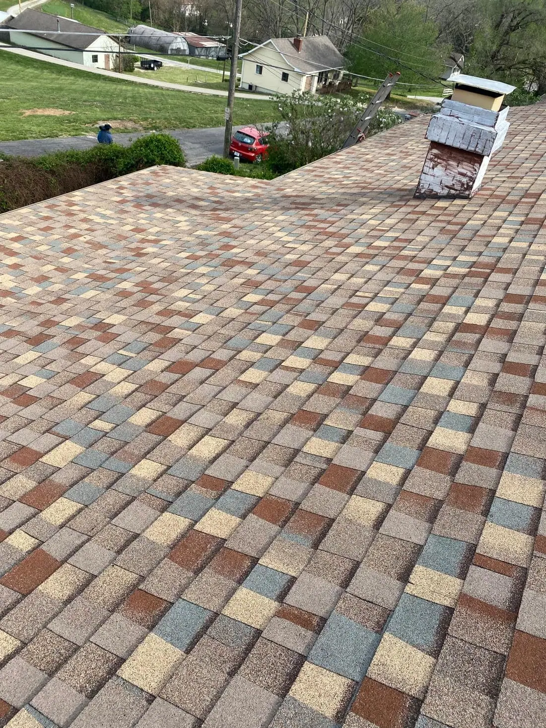 New multi-color blend shingles on a roof looking out over a St. Joseph neighborhood